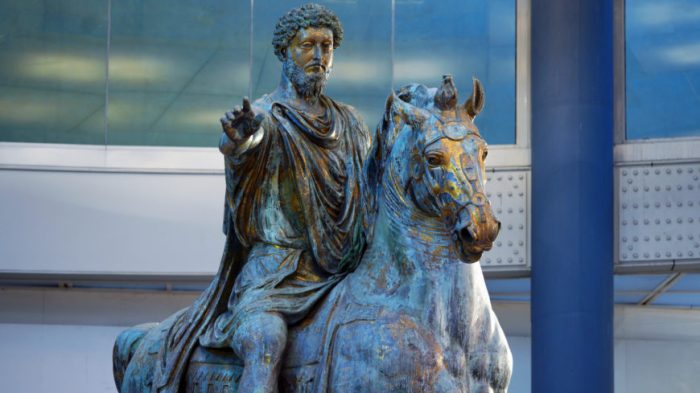 Patrician carrying portrait busts of two ancestors